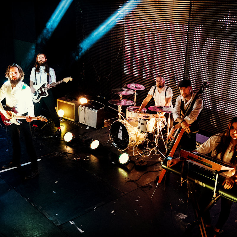 The Thinking Men - Deepdale Festival | 28th to 30th September 2018 - Our Saturday evening headliners on the Brick Barn Stage are the electrifying Thinking Men. Based in Norwich, this five-piece rock band bring a unique, powerful, unpredictable, wholly infectious energy to their live performances. Technically accomplished musically, and drawing on influences as diverse as Johnny Cash, The Rolling Stones, Donavan and Jack White, their 2017 EP Memento Mori is a tour de force of modern, serious rock music. We challenge you to emerge from their show without dancing your shoes off!<br />Theatrical, edgy, provocative, dramatic, original and utterly brilliant. You must come and see The Thinking Men at Deepdale!